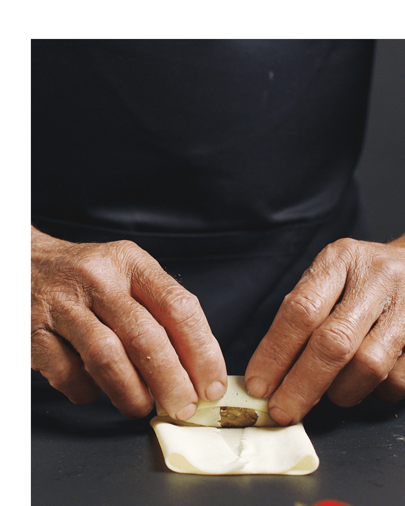 Chef handcrafting Pan Roll crepes.