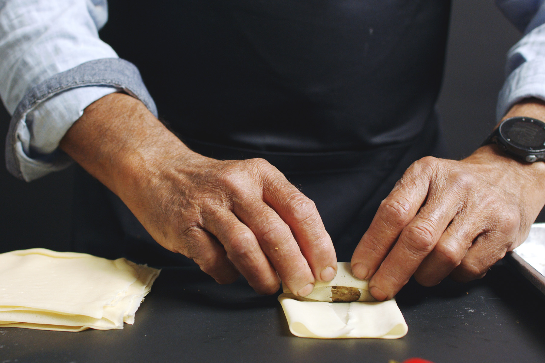 Chef handcrafting Pan Roll crepes.